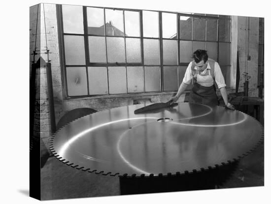 Quality Checking a Giant Saw Blade, Edgar Allens Steel Foundry, Sheffield, South Yorkshire, 1963-Michael Walters-Stretched Canvas