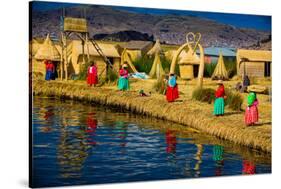 Quechua Indian Family on Floating Grass Islands of Uros, Lake Titicaca, Peru, South America-Laura Grier-Stretched Canvas
