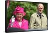 Queen Elizabeth II and Prince Philip wave to the crowd at her 90th birthday celebrations-Associated Newspapers-Framed Stretched Canvas
