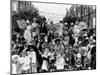 Queen Elizabeth II at a Street Party in Fancy Dress in Methley Street and Radcot Street in London-null-Mounted Photographic Print