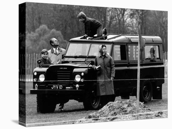 Queen Elizabeth II Looks on as Prince Edward Plays on the Roof of Their Land Rover-null-Stretched Canvas