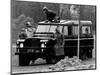 Queen Elizabeth II Looks on as Prince Edward Plays on the Roof of Their Land Rover-null-Mounted Photographic Print