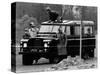 Queen Elizabeth II Looks on as Prince Edward Plays on the Roof of Their Land Rover-null-Stretched Canvas