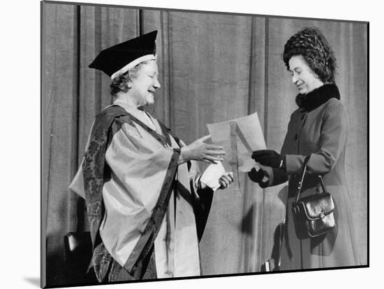 Queen Elizabeth II presents her mother with the degree of Honorary Doctorate of Music-Associated Newspapers-Mounted Photo