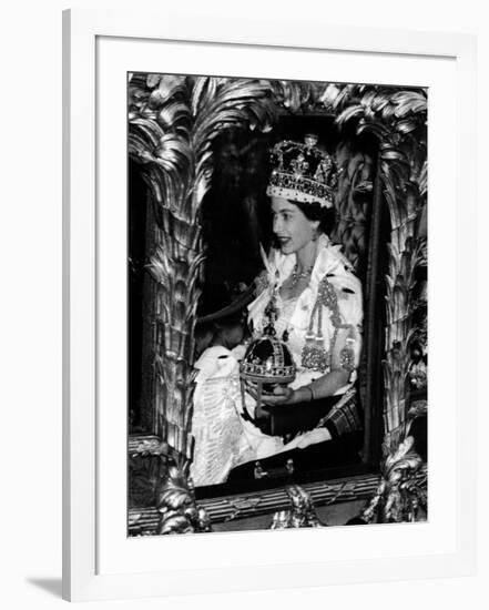 Queen Elizabeth II Riding Along in the Coronation Coach Wearing Crown and Carrying Orb-null-Framed Photographic Print