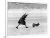 Queen Elizabeth II walking her pet corgis-Associated Newspapers-Framed Photo