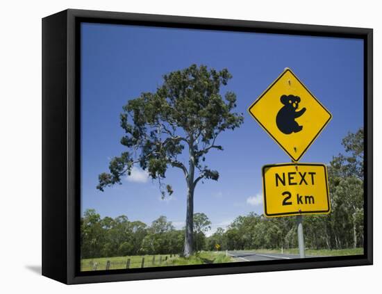 Queensland, Fraser Coast, Maryborough, Koala Crossing Sign on the Bruce Highway, Australia-Walter Bibikow-Framed Stretched Canvas