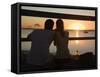 Queensland, Fraser Island, A Couple with Video Camera in Hand Watch Sunset from a Pier, Australia-Andrew Watson-Framed Stretched Canvas