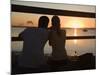 Queensland, Fraser Island, A Couple with Video Camera in Hand Watch Sunset from a Pier, Australia-Andrew Watson-Mounted Photographic Print