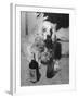 R. A. Christie's Dog Looking Rather Bored at Globetrotters Costume Party-null-Framed Photographic Print