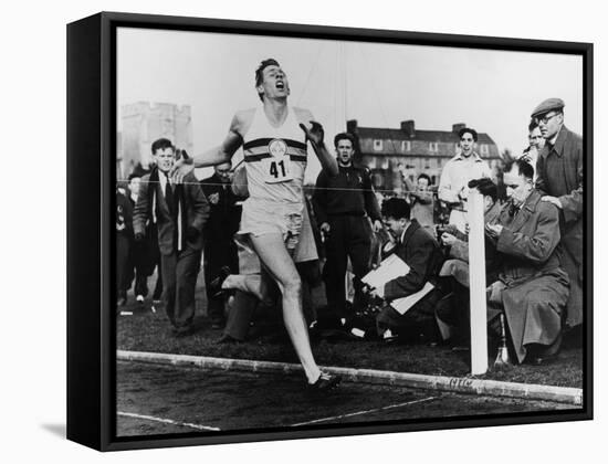 R. Bannister Runs Mile-null-Framed Stretched Canvas