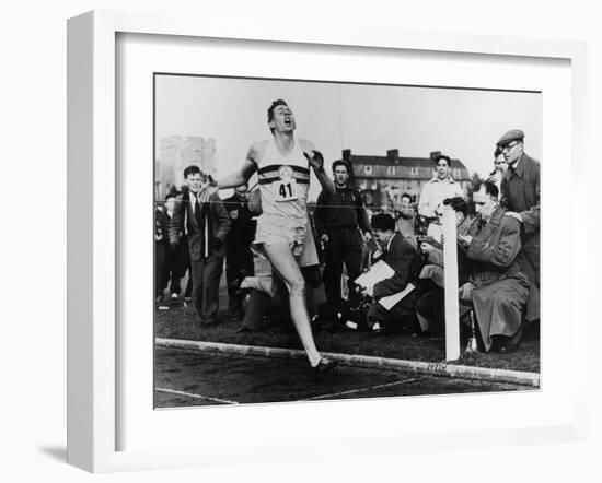 R. Bannister Runs Mile-null-Framed Premium Photographic Print