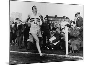 R. Bannister Runs Mile-null-Mounted Photographic Print