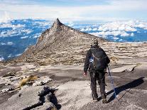 Hiker Walking at the Top of Mount Kinabalu in Sabah, Malaysia-R.M. Nunes-Photographic Print