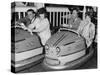 Racing Drivers Graham Hill and Jim Clark Enjoying a Dodgem Ride-null-Stretched Canvas