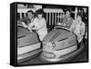 Racing Drivers Graham Hill and Jim Clark Enjoying a Dodgem Ride-null-Framed Stretched Canvas