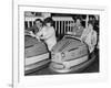 Racing Drivers Graham Hill and Jim Clark Enjoying a Dodgem Ride-null-Framed Photographic Print