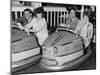 Racing Drivers Graham Hill and Jim Clark Enjoying a Dodgem Ride-null-Mounted Photographic Print