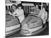 Racing Drivers Graham Hill and Jim Clark Enjoying a Dodgem Ride-null-Mounted Photographic Print