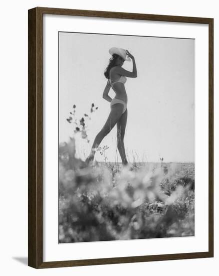 Racquel Welch Sporting a White Cowboy Hat While Posing in a Bikini-null-Framed Premium Photographic Print