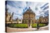 Radcliffe Camera with Cyclist, Oxford, Oxfordshire, England, United Kingdom, Europe-John Alexander-Stretched Canvas