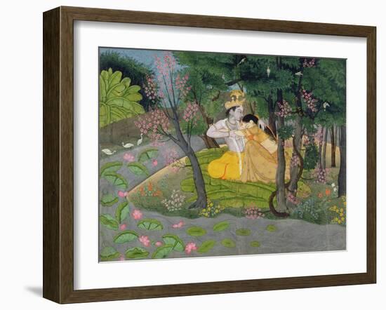 Radha and Krishna Embrace in a Grove of Flowering Trees, c.1780-null-Framed Giclee Print