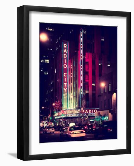 Radio City Music Hall and Yellow Cab by Night, Manhattan, Times Square, NYC, Old Vintage Colors-Philippe Hugonnard-Framed Photographic Print