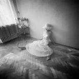 A Young Woman Sat on a Red Bed Sheet-Rafal Bednarz-Photographic Print