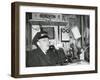 Railroad Conductor Uses an on Board Telephone to Communicate with Other Parts of the Train-null-Framed Photo