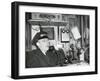 Railroad Conductor Uses an on Board Telephone to Communicate with Other Parts of the Train-null-Framed Photo