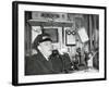 Railroad Conductor Uses an on Board Telephone to Communicate with Other Parts of the Train-null-Framed Photo