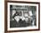 Railroad Conductor Uses an on Board Telephone to Communicate with Other Parts of the Train-null-Framed Photo