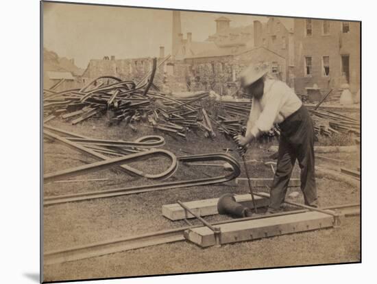 Railroad Construction Worker Straightening Track, c.1862-Andrew J^ Johnson-Mounted Photo