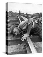 Railroad Section Boss D. D. Pittman Checking to Make Sure New Rail is properly level-Alfred Eisenstaedt-Stretched Canvas