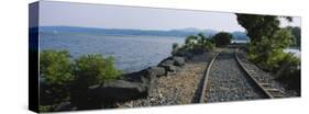Railroad Track Along a River, Hudson River, Kingston, New York State, USA-null-Stretched Canvas