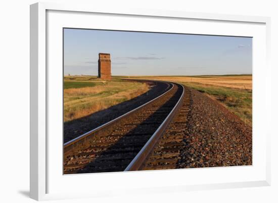 Railroad Tracks Lead to Old Wooden Granary in Collins, Montana, Usa-Chuck Haney-Framed Photographic Print