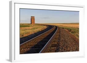 Railroad Tracks Lead to Old Wooden Granary in Collins, Montana, Usa-Chuck Haney-Framed Photographic Print