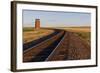 Railroad Tracks Lead to Old Wooden Granary in Collins, Montana, Usa-Chuck Haney-Framed Photographic Print