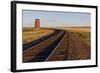 Railroad Tracks Lead to Old Wooden Granary in Collins, Montana, Usa-Chuck Haney-Framed Photographic Print