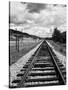 Railroad Tracks Stretching into the Distance-Philip Gendreau-Stretched Canvas