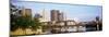 Railway bridge across a river with skyscrapers in the background, Scioto River, Columbus, Ohio, USA-null-Mounted Photographic Print