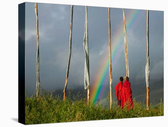 Rainbow and Monks with Praying Flags, Phobjikha Valley, Gangtey Village, Bhutan-Keren Su-Stretched Canvas