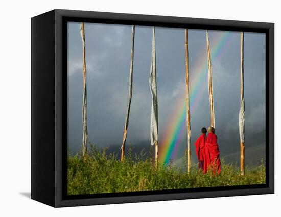 Rainbow and Monks with Praying Flags, Phobjikha Valley, Gangtey Village, Bhutan-Keren Su-Framed Stretched Canvas