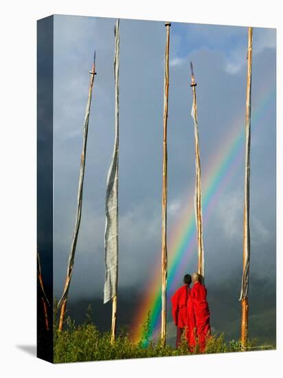 Rainbow and Monks with Praying Flags, Phobjikha Valley, Gangtey Village, Bhutan-Keren Su-Stretched Canvas