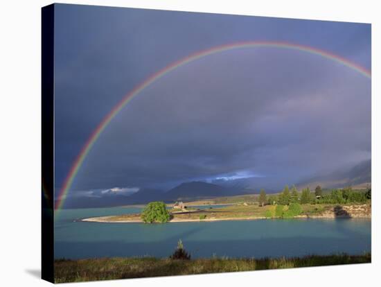 Rainbow over Lake Tekapo, Canterbury, South Island, New Zealand, Pacific-Jeremy Bright-Stretched Canvas