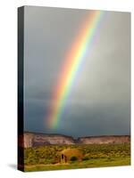 Rainbow over Navajo Hogan, Monument Valley Navajo Tribal Park, Utah, USA-Charles Crust-Stretched Canvas