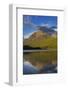 Rainbow Peak reflects in Bowman Lake in Glacier National Park, Montana, USA-Chuck Haney-Framed Photographic Print