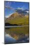Rainbow Peak reflects in Bowman Lake in Glacier National Park, Montana, USA-Chuck Haney-Mounted Photographic Print