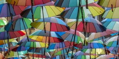 https://imgc.allpostersimages.com/img/posters/rainbow-umbrellas-bucharest-romania_u-L-Q1H7MZB0.jpg?artPerspective=n