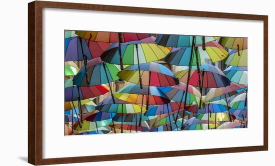 Rainbow umbrellas, Bucharest, Romania-Art Wolfe Wolfe-Framed Photographic Print